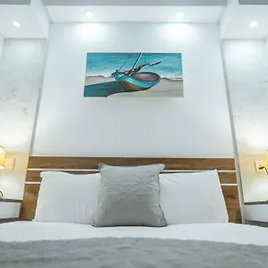 Apartman Tsolias, Protarász